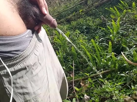 After urinating in the forest, a handjob under the hot sun with my cock