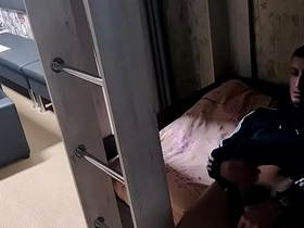 Guy in adidas jerking off in an empty hostel room