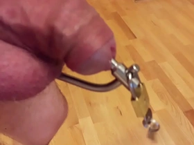 Male urethral chastity with small bullet plug inside first