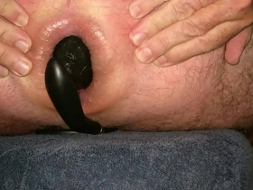 Huge inflatable butt plug sliding out of my stretched ass up close in slow motion